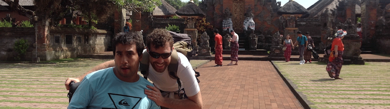 Young man with his support worker traveling in SouthEast Asia